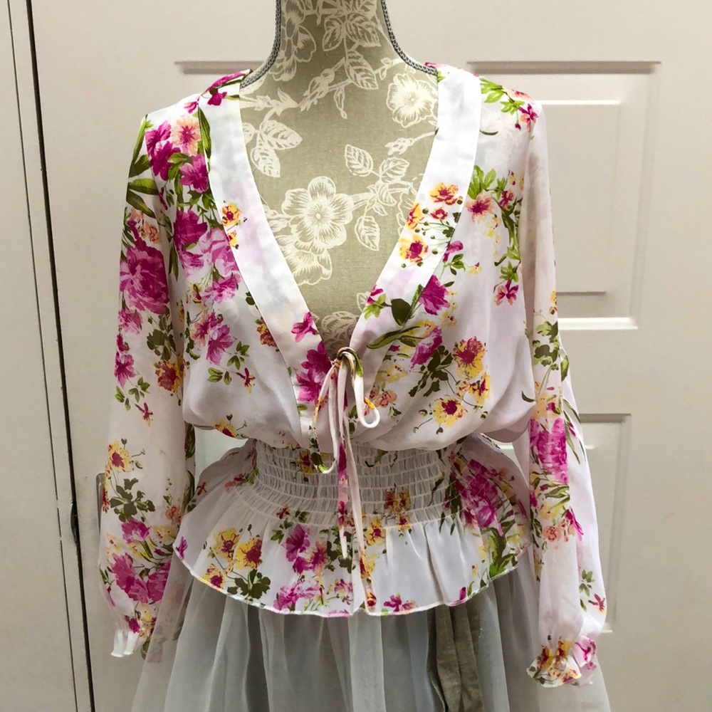 Floral top, sheer blouse.